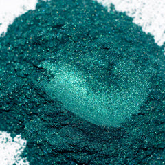 Mica powder in teal green with glittery particles, used for cosmetics