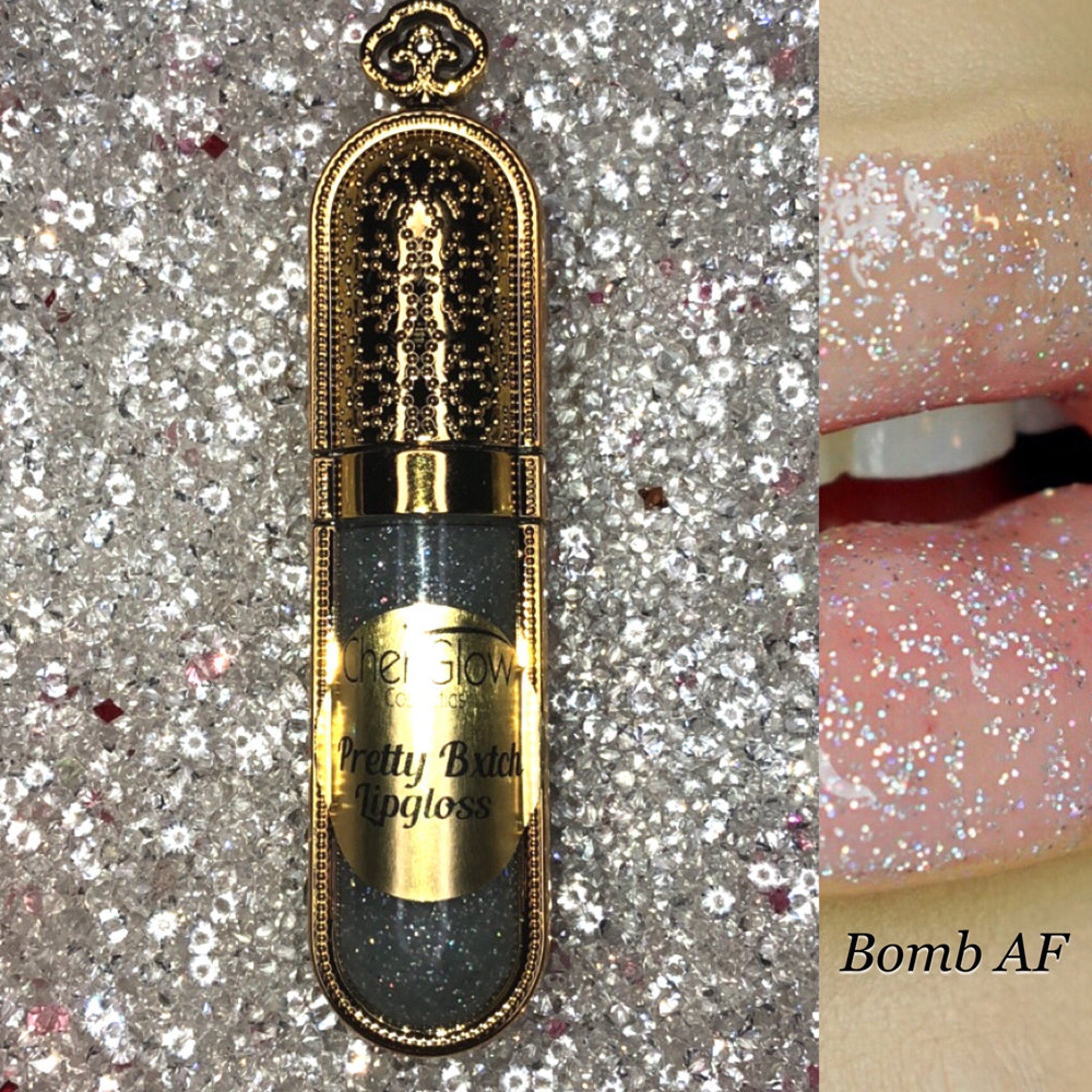 Lip gloss bottle with gold accents, glittery silver liquid, and "Pretty Bxtch" text on label