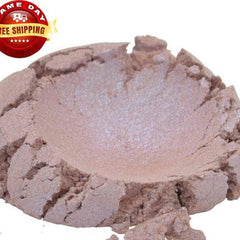 Close-up of 4 oz jar filled with shimmering winter rose pink mica pigment powder for eyeshadow