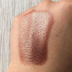 Close-up of Tala Gingerbread BR7 Eye Shadow Pigment showing rich bronze shimmer in compact 2ml jar