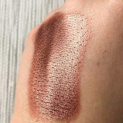 Side view of Tala Gingerbread BR7 Eye Shadow Pigment pot showing rich bronze shimmer and compact size