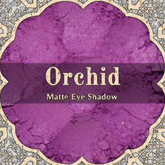Vegan loose powder eyeshadow in bright orchid and magenta purple shades with matte finish