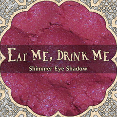 Vegan eyeshadow jar with cool pink and purple duochrome shimmer powder, showcasing metallic shift in light