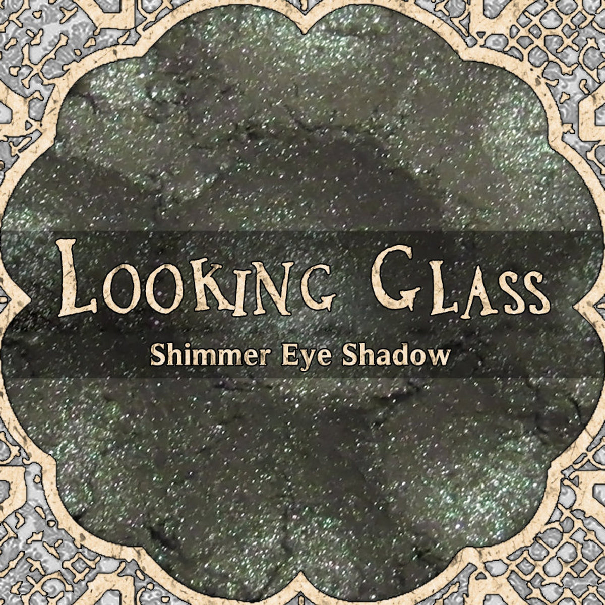 Grey duochrome loose powder eyeshadow with shimmer finish in a clear glass jar, vegan formula
