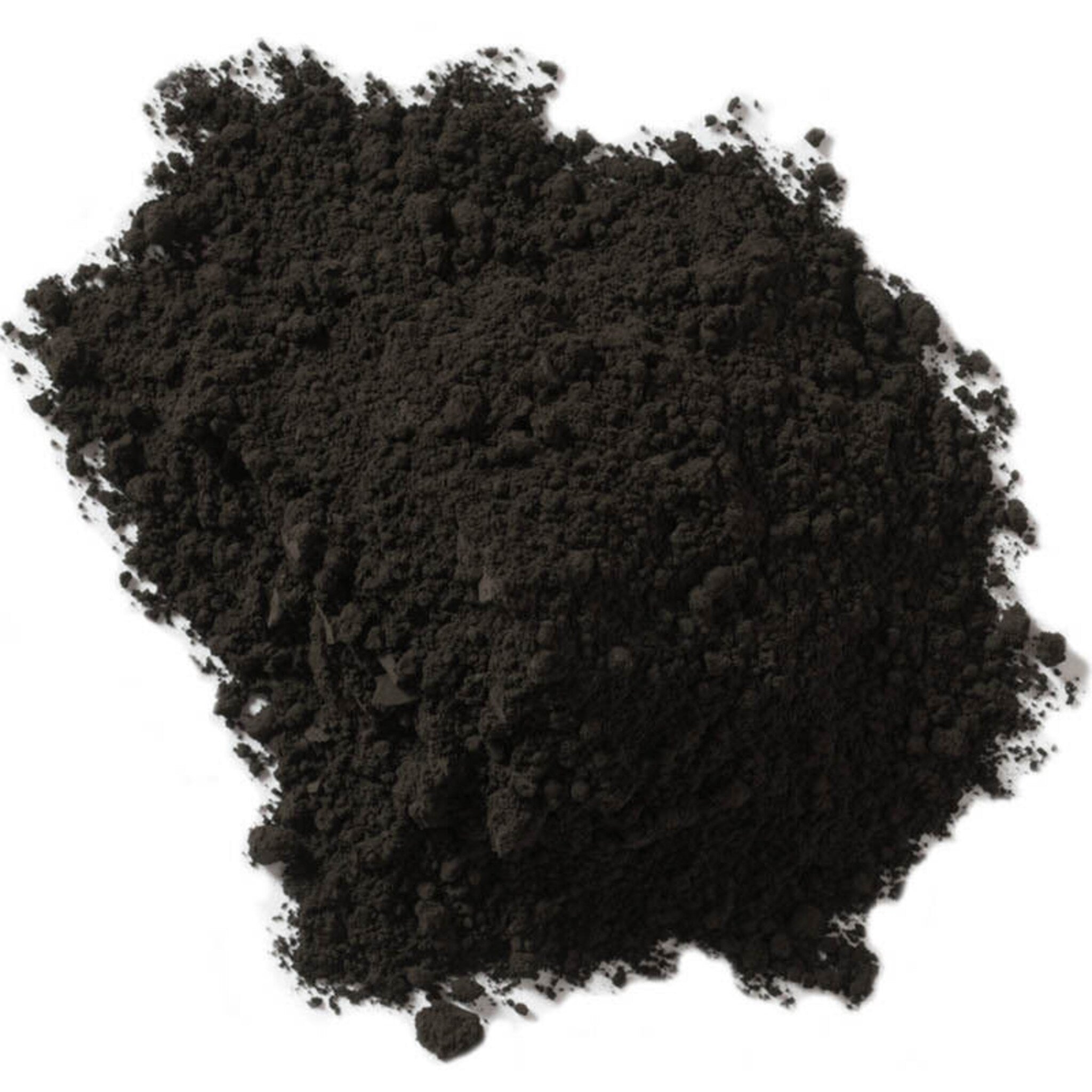 Close-up of mineral eye shadow powder showing fine mica pigment texture in a neutral beige shade
