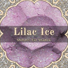 Pale lilac loose powder eyeshadow with shimmer finish in a sleek round jar, vegan formula