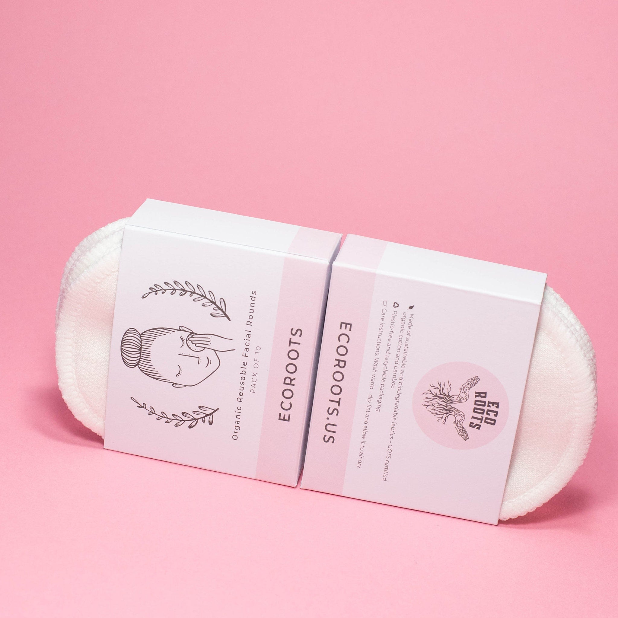 Reusable facial rounds with white cotton fabric, packaged in a box with pink accents, ECO ROOTS branding visible