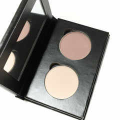 Side view of pink bisque eye shadow duo in paperboard palette showing compact size and matte finish