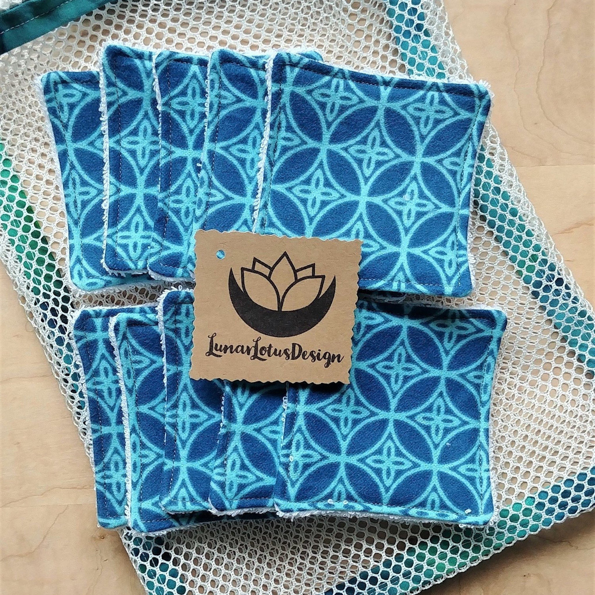 Reusable facial rounds with blue geometric pattern and white trim, Lunar Lotus Design tag