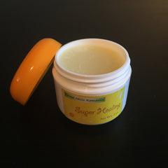 Healing cream in white jar with yellow label and orange lid, Forest Hills Remedies brand