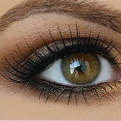 Side view of Piccoli Piaceri hazelnut pearl mineral eyeshadow in compact with reflective gold packaging