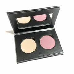 Close-up of pressed pink and vanilla vegan eyeshadow duo with smooth matte finish in compact palette
