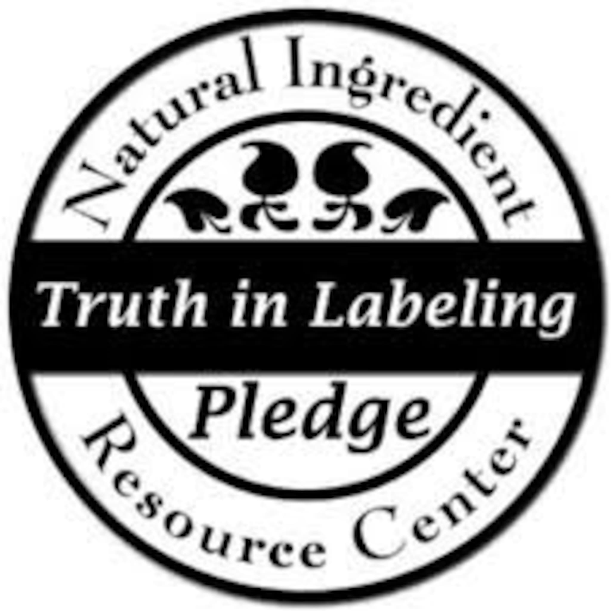 Natural Ingredient Labeling Pledge logo, black and white circular design with text, decorative floral accents