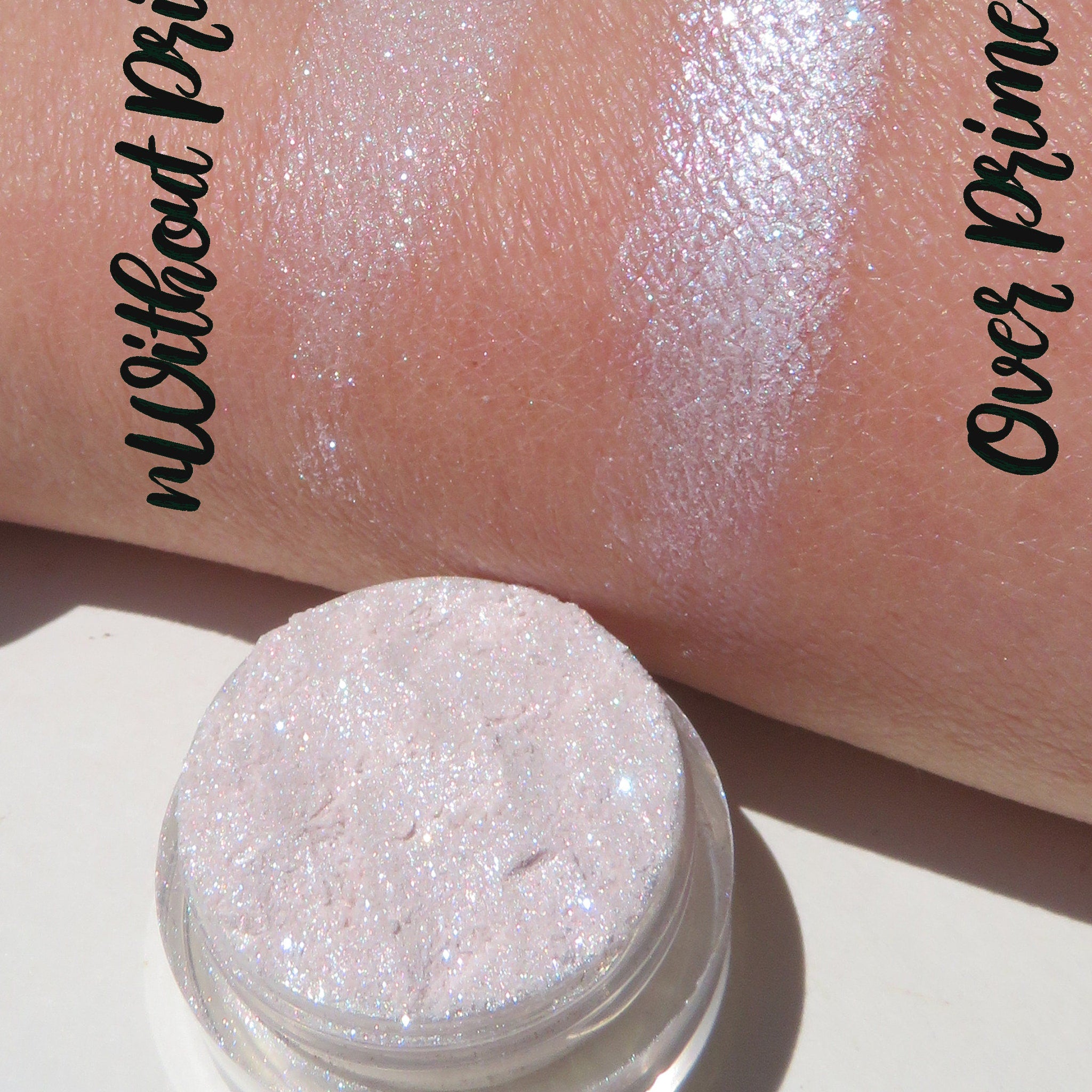 Side angle of sheer pink sparkly glitter eye shadow pot showing shimmer texture and vegan makeup details