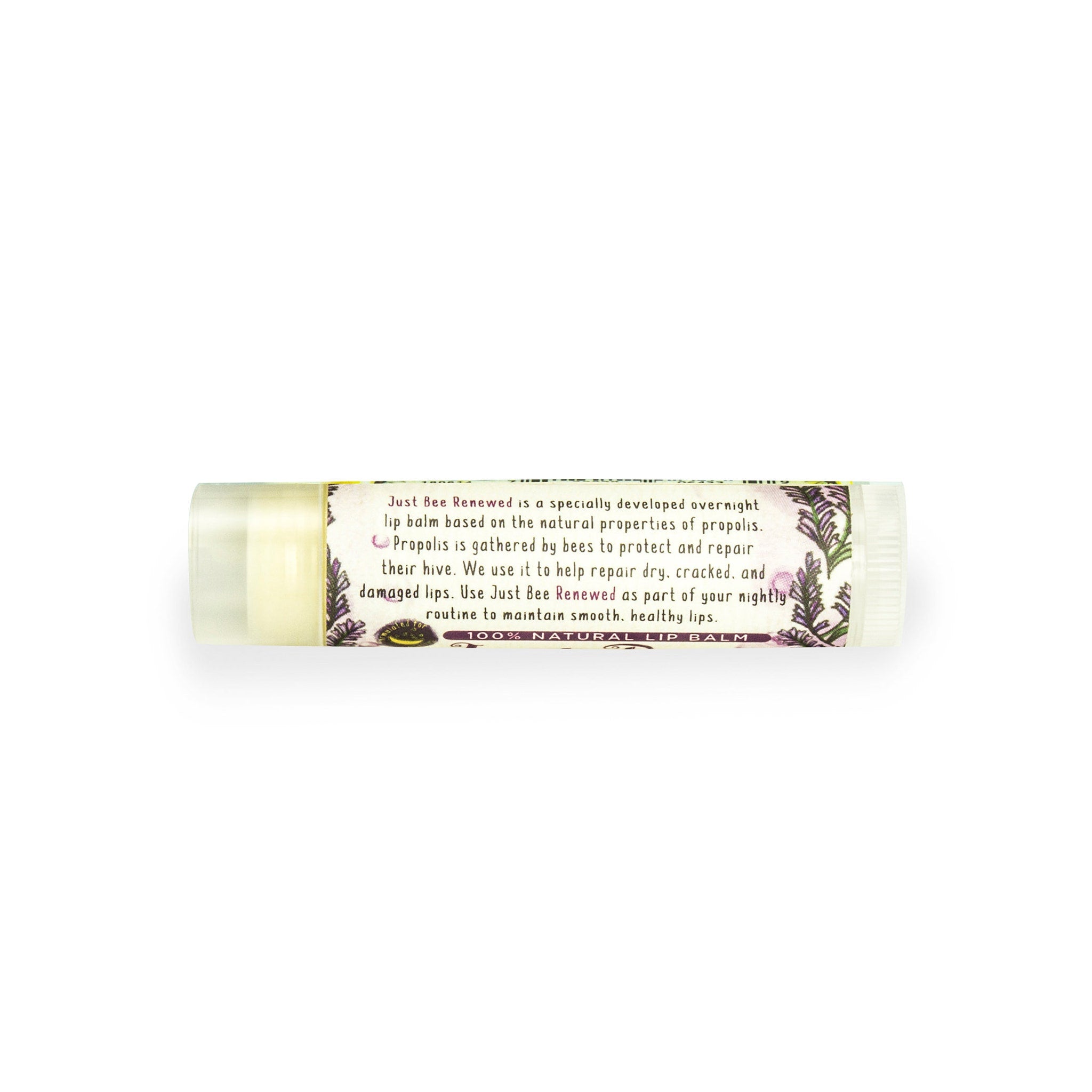 Lip balm tube with clear plastic, floral pattern, and Just Bee Renewed text