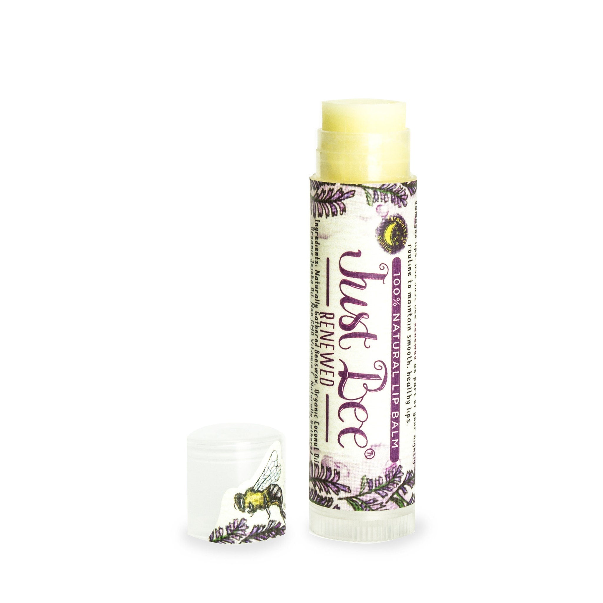 Lip balm tube with yellow balm, white cap, and Just Bee branding with purple floral pattern.