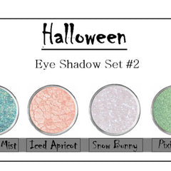 Eye shadow set with teal, peach, and white colors, in round containers, for Halloween