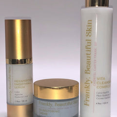 Skincare products, gold and white bottles, blue and gold jar, Frankly, Beautiful Skin branding