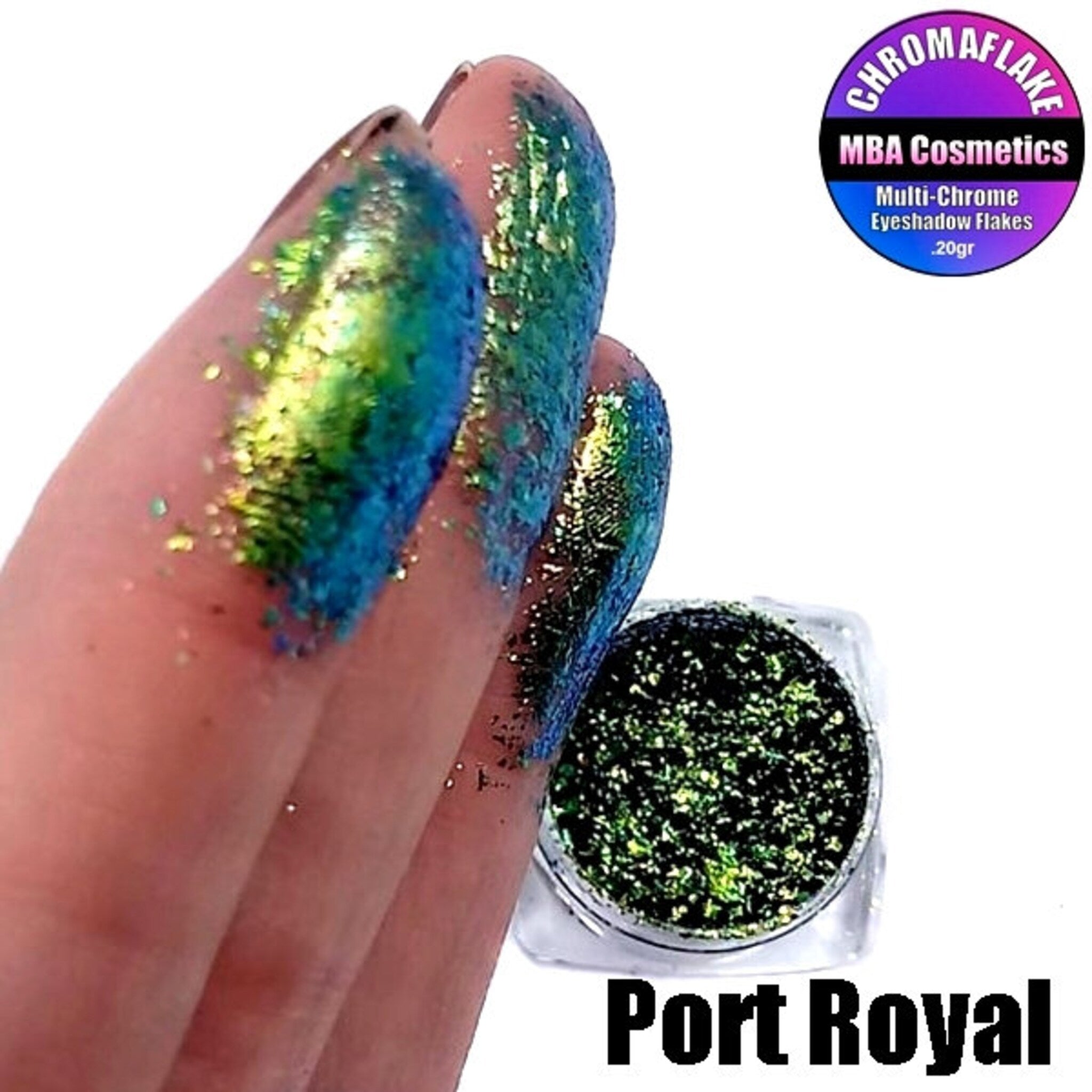 Close-up of multichrome eye shadow flakes in Port Royal, showing shifting blue-green-purple hues and reflective glitter particles