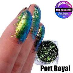 Close-up of multichrome eye shadow flakes in Port Royal, showing shifting blue-green-purple hues and reflective glitter particles