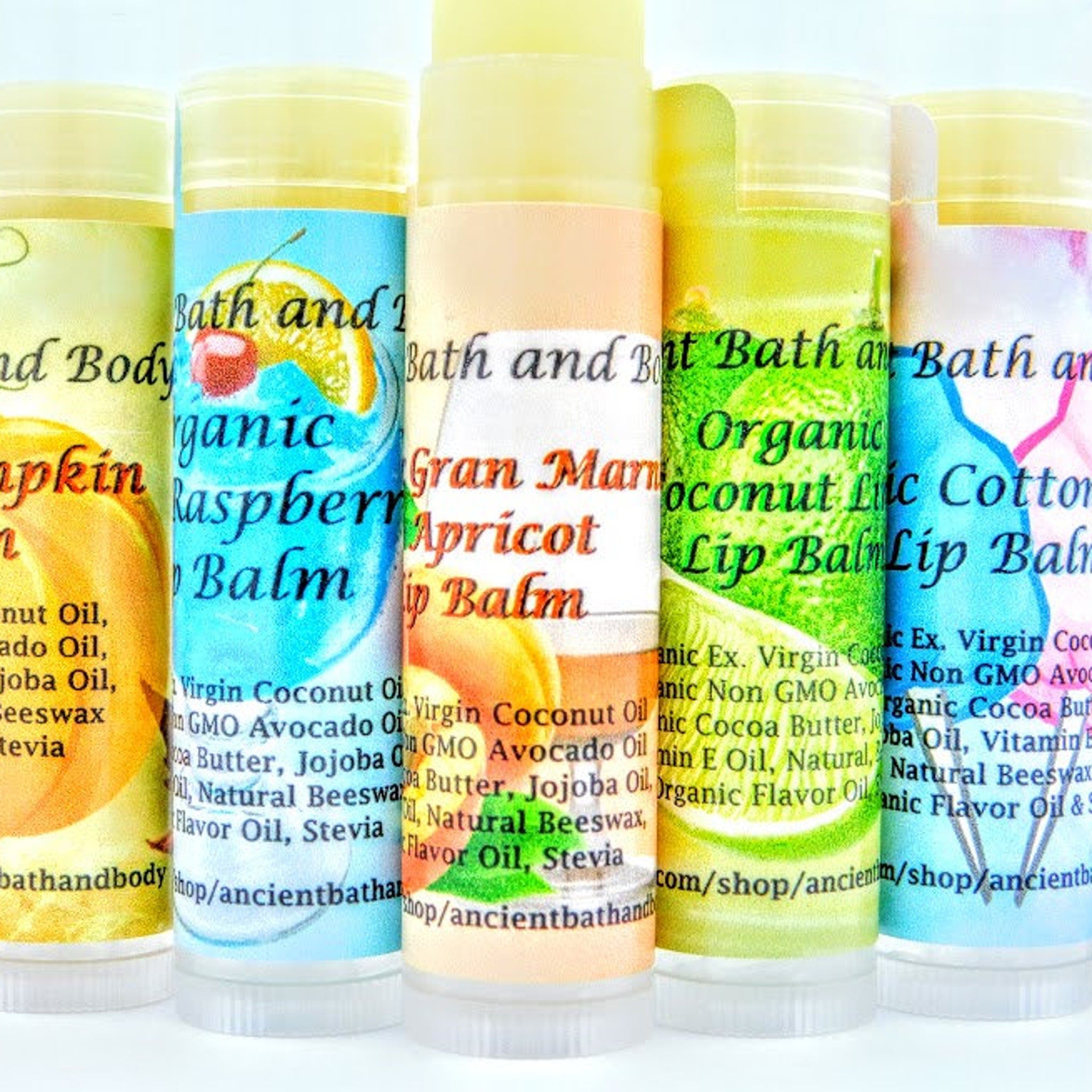 Lip balms, colorful tubes with text, Ancient Bath and Body branding visible