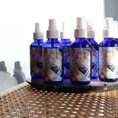 Damascus Rose Water bottles, blue glass, white spray tops, Fleuressence brand