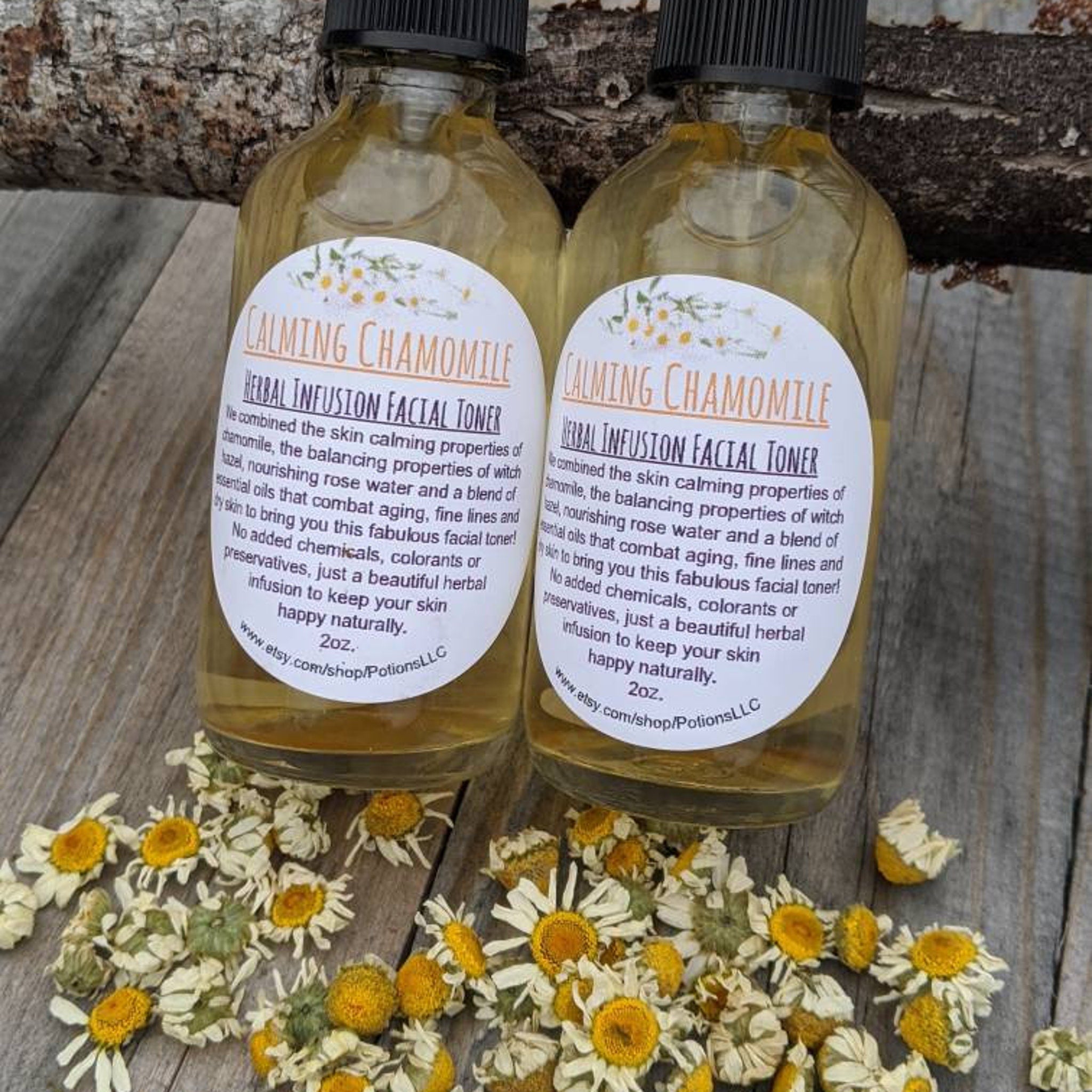 Facial toner bottles with yellow liquid, black caps, and white labels on wooden surface