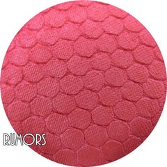 Pressed mineral eyeshadow in a soft pink shade with satin finish, displayed in a compact case.