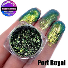 Close-up of Chromaflake Multichrome Eye Shadow Flakes in Port Royal, showing iridescent blue-purple shift in jar