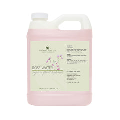 Rose water bottle, pink liquid, white plastic bottle with handle, Organic Pure Oil brand