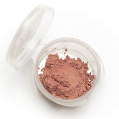 Side view of matte beige pink mineral eyeshadow sample in compact with vegan label visible