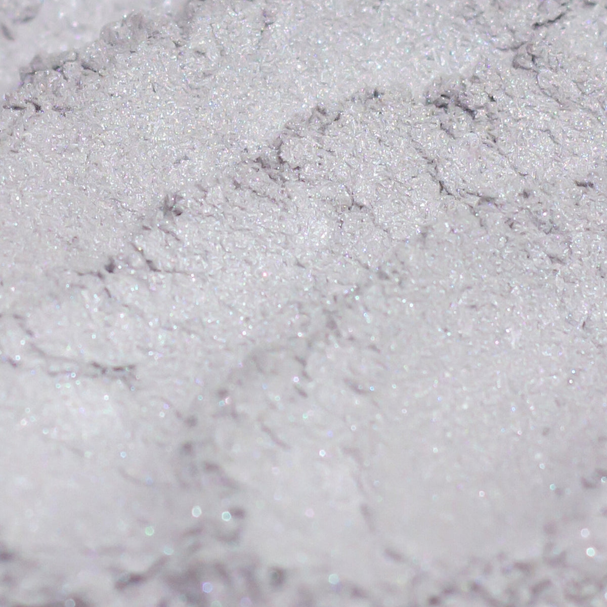 Frosty silver gray eyeshadow pan with lavender shimmer, vegan mineral makeup in compact packaging