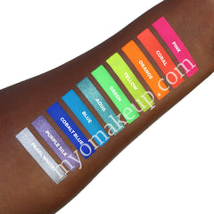 Close-up of 10 vibrant eyeshadow pigments in rainbow hues with ultra-bright shimmer finish