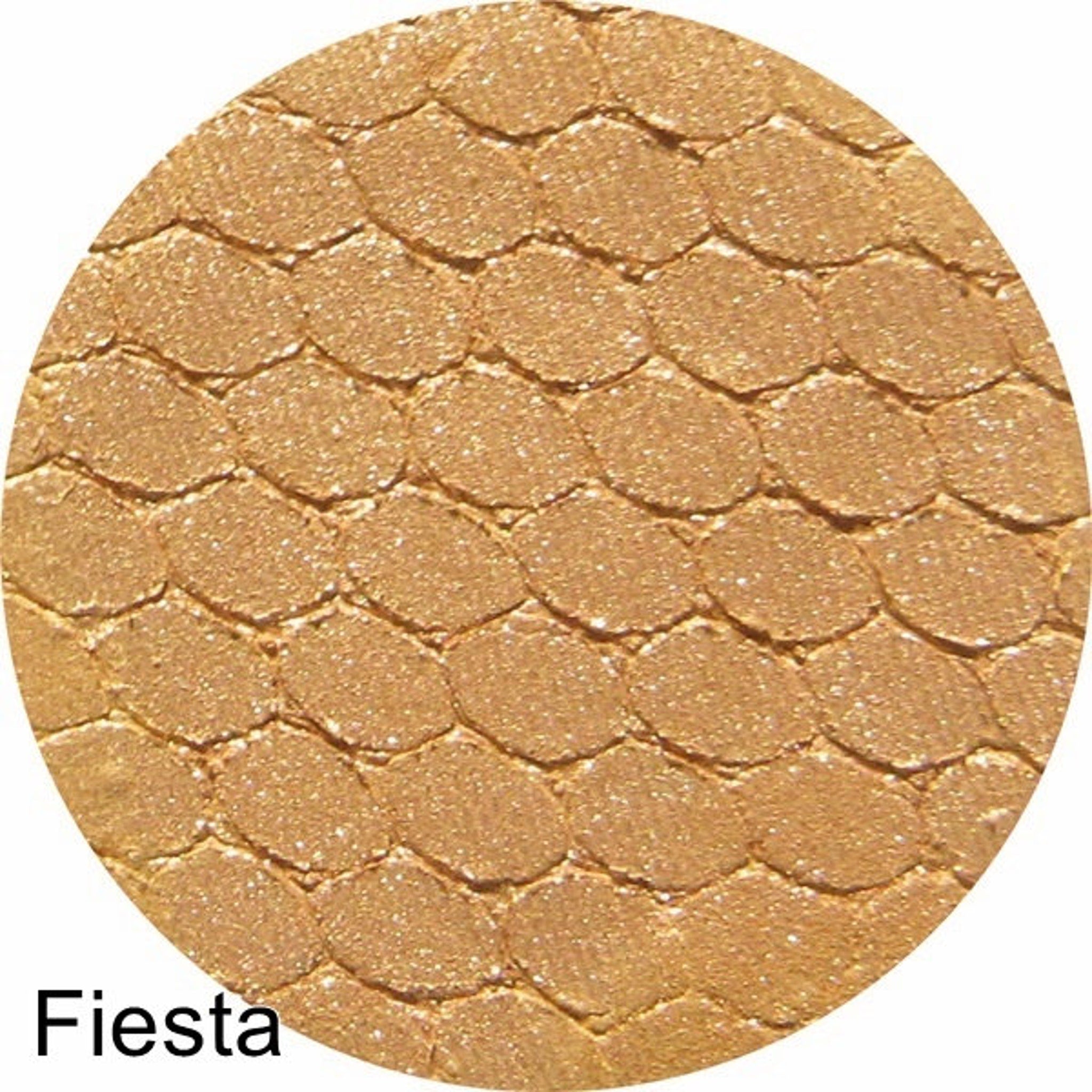 Silk FX Pressed Eye Shadow in Fiesta, a vibrant orange-peach shade with smooth satin finish in compact case