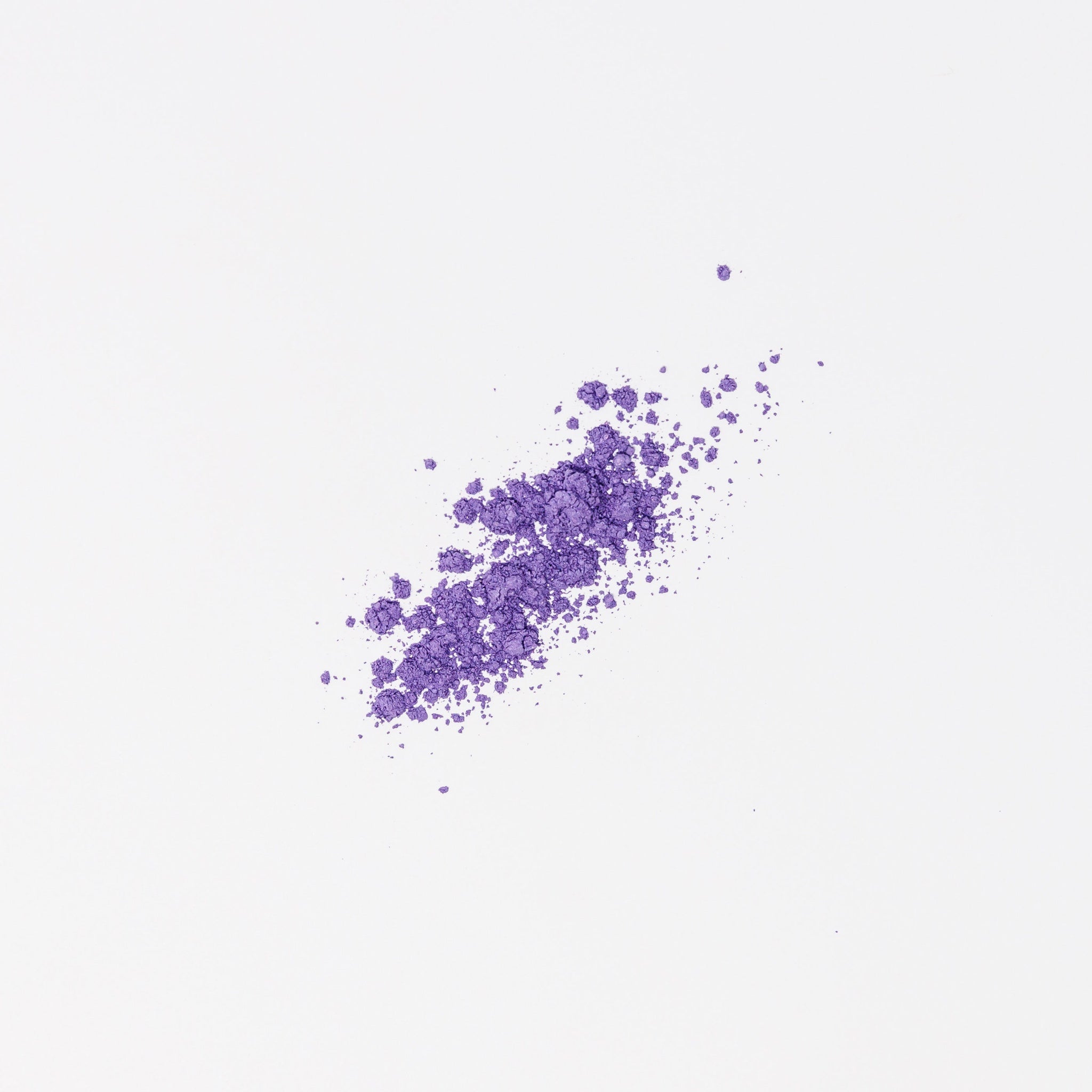 Side view of vegan mineral eyeshadow pot showing natural purple powder with soft shimmer finish