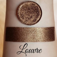 Lourve Shimmer Eyeshadow palette with reflective pressed pigments and loose powder in a sleek black compact