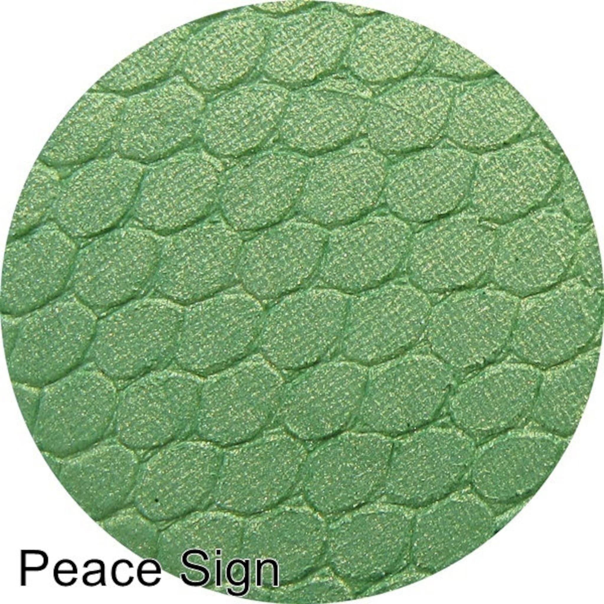 Eye shadow green pressed powder with textured pattern, Silk FX Peace Sign