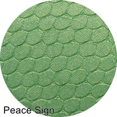 Silk FX Pressed Eye Shadow in Peace Sign, showcasing smooth matte finish and vibrant teal color in compact case