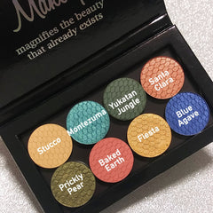 Side view of Silk FX Pressed Eye Shadow in Fiesta showing vibrant orange shimmer and smooth pressed powder texture