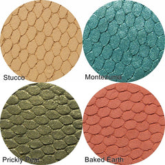 Hand applying shimmering teal Silk FX Pressed Eye Shadow to eyelid with brush