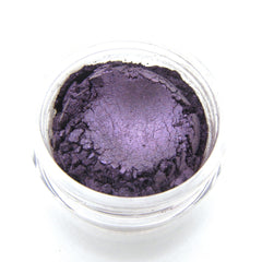 Side view of dark purple vegan mineral eye shadow pot showing matte finish and compact size