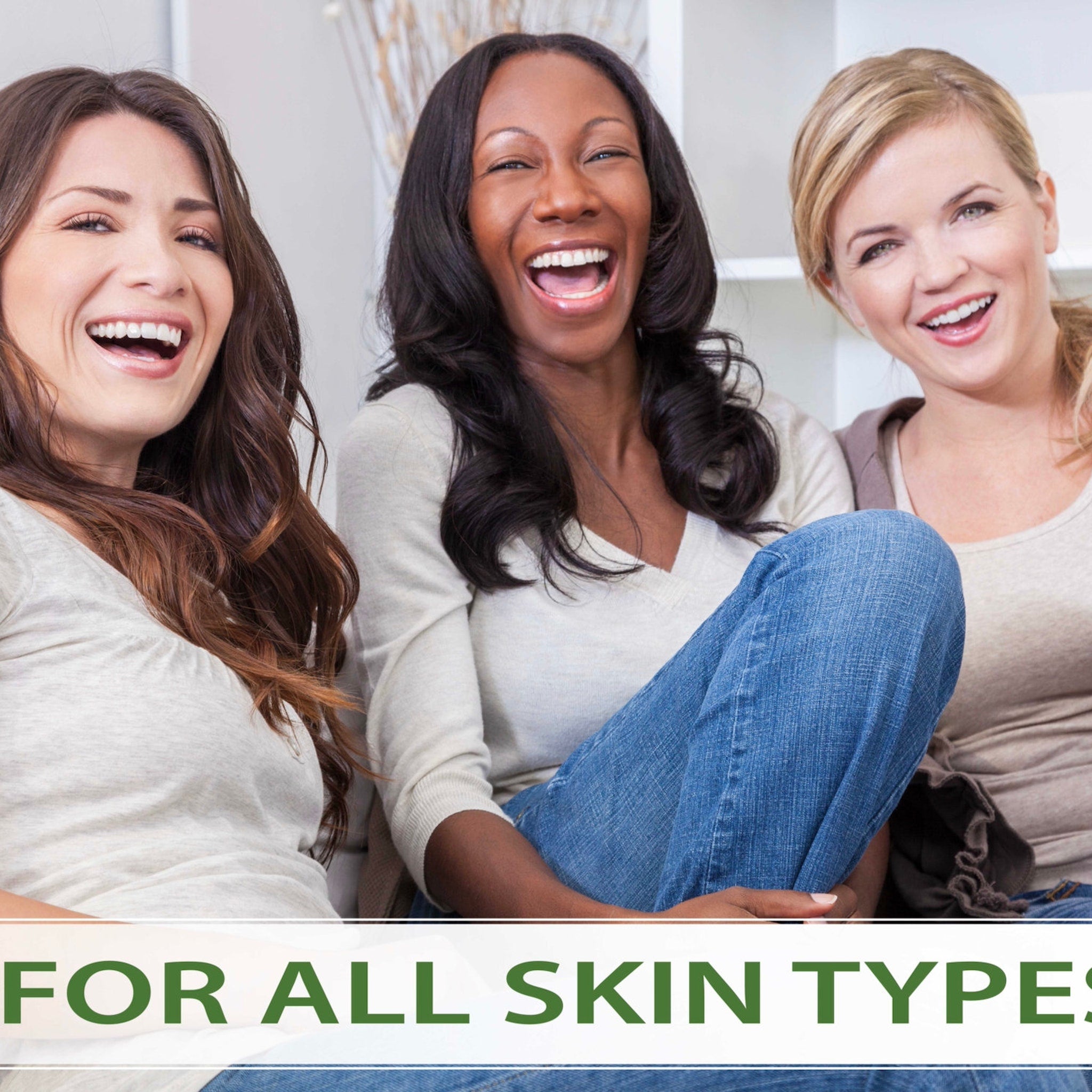 Diverse women smiling, wearing neutral tops and denim jeans, promoting skincare products