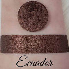Close-up of Bellavoni Shimmer Eyeshadow in a reflective magnetic pan with vibrant pressed pigment and sparkling loose particles