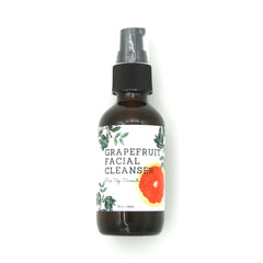 Facial Cleanser bottle, brown glass, black pump, with label and grapefruit image