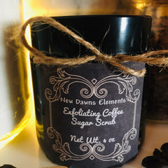 Exfoliating Coffee Sugar Scrub jar with black label, twine, and New Dawn Elements text