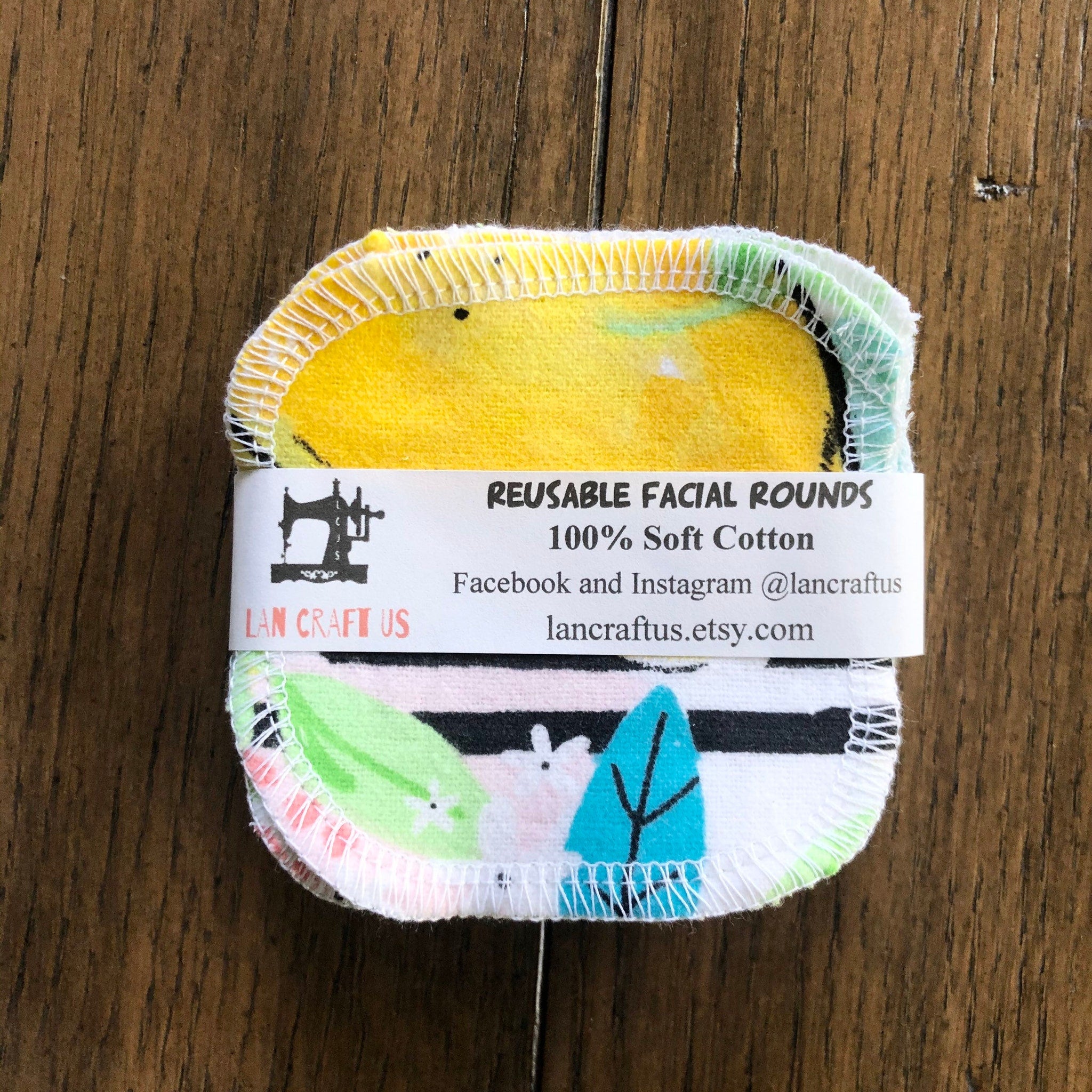 Reusable facial rounds with yellow, patterned fabric and white stitching, LanCraftUS brand