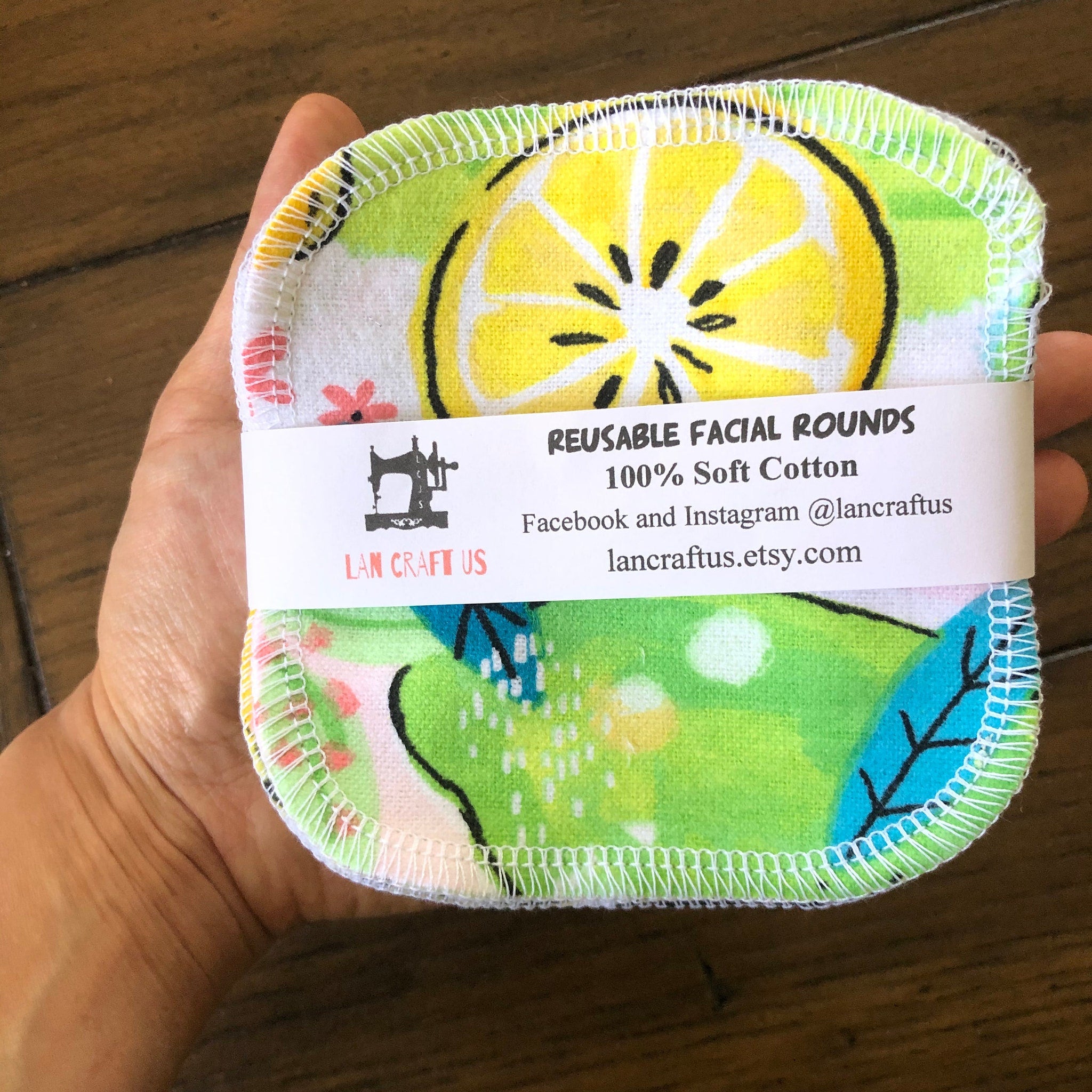 Reusable facial rounds with yellow lemon print, white stitching, and LAN CRAFT US label