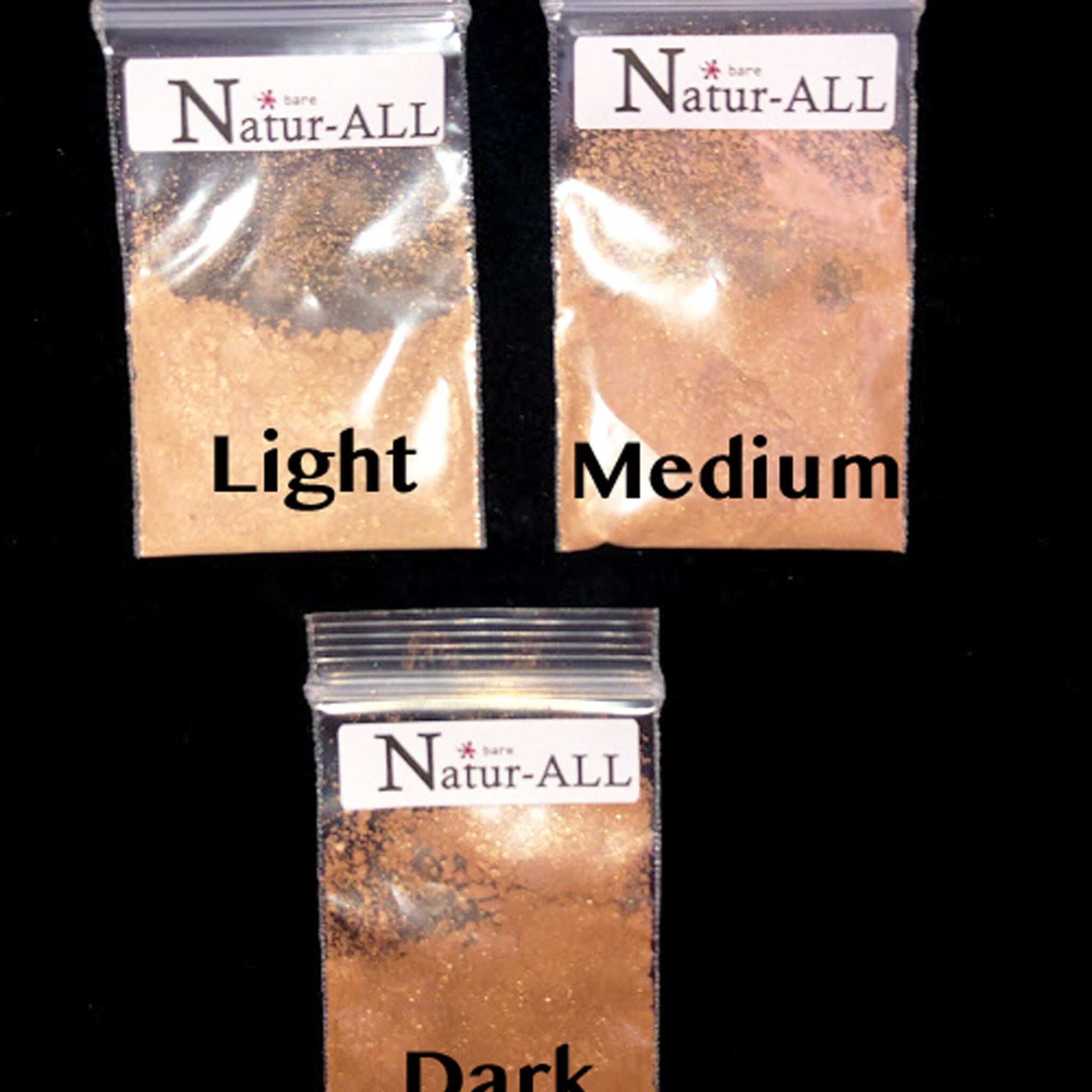 Bronzer samples in clear plastic bags, labeled Light, Medium, Dark, barenatur-ALL logo visible