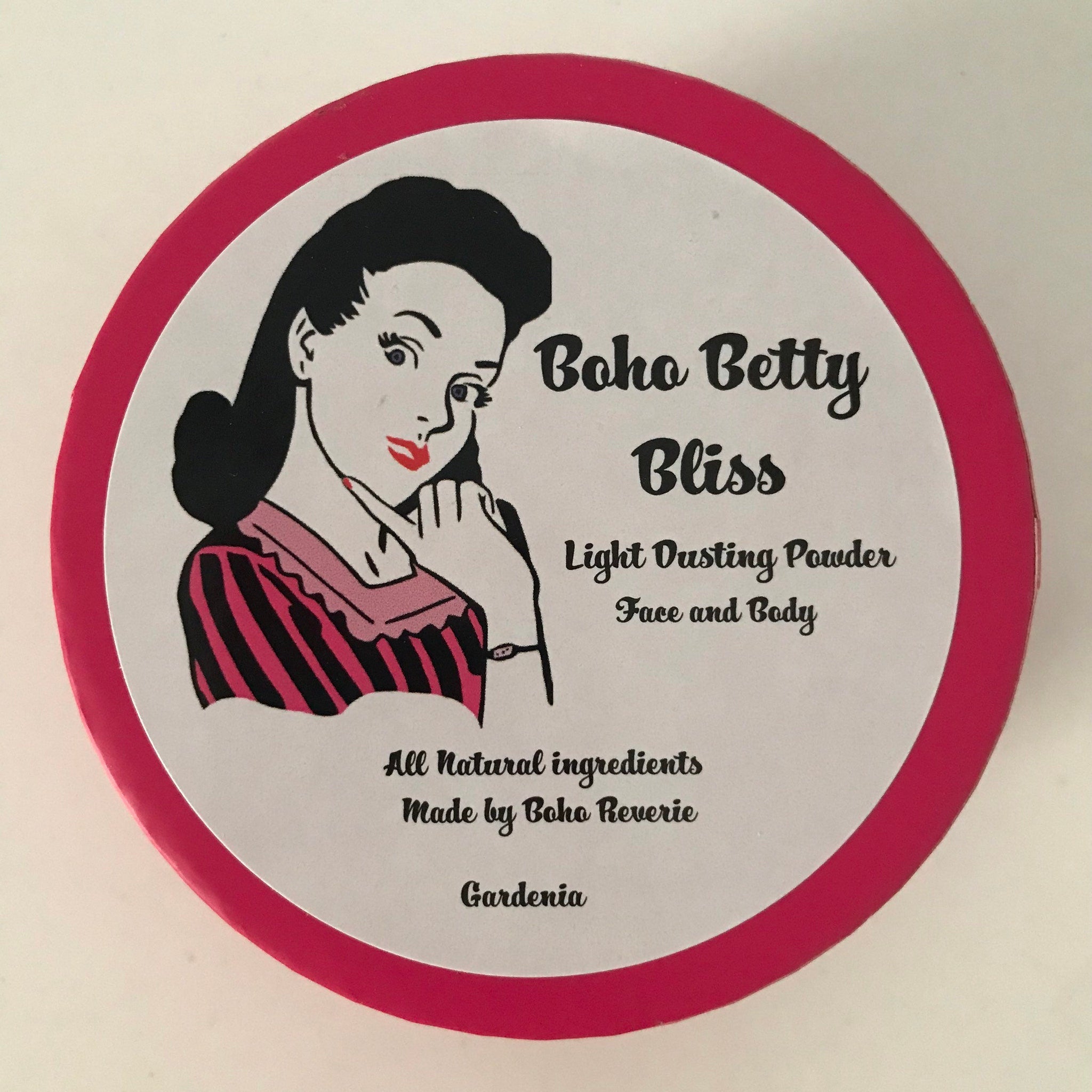 Dusting powder with pink and black striped design, Boho Betty Bliss branding, for face and body use