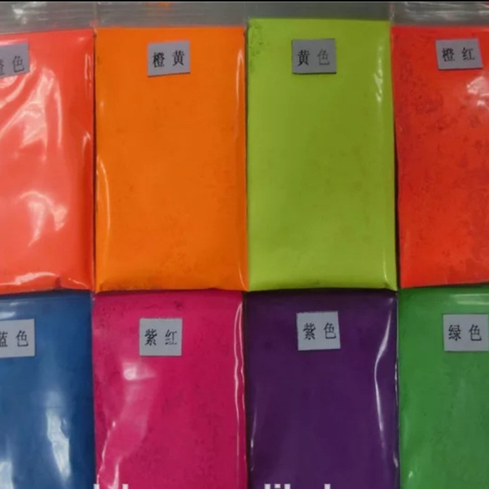 Close-up of DBAA Neon Glitter Eye Shadow palette showing vibrant rainbow colors in compact case